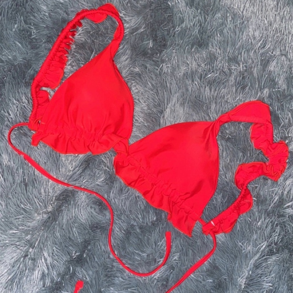 Ruffled swimsuit top